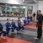 Head Master Instructor Scott Jones addressing new black belts martial arts katy